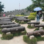 Some locally made iron cannons are on display.