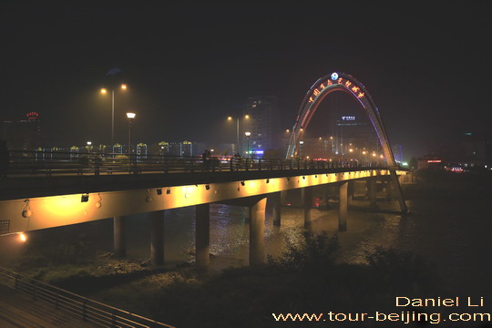 The brightly lit bridge in Ya’an