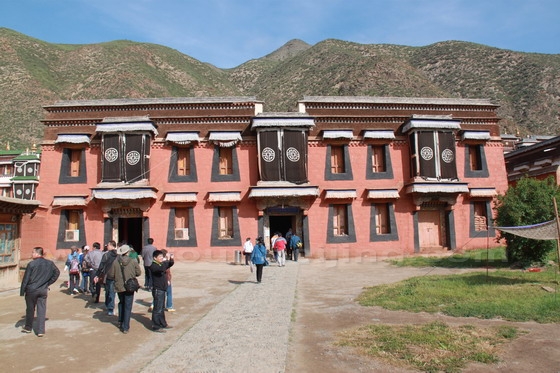 We are inside the compound of the small yak butter sculptures museum.