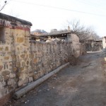 With Mr.Zhang taking the lead, we walk along the narrow lanes in the village