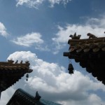 Blue sky, white clouds and the temple eaves