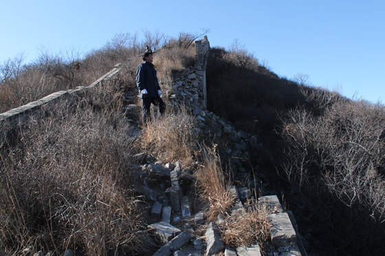 Some parts of the wall are collapsed and broken