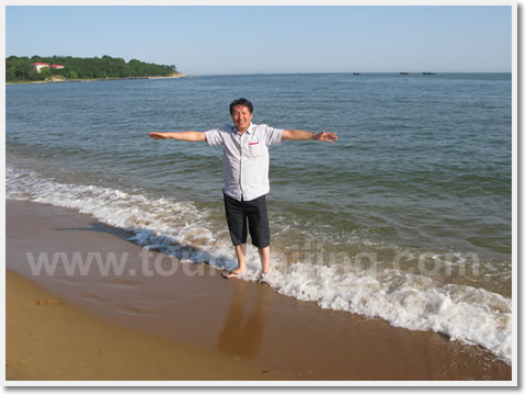 I'm flying!  It felt so great walking on the soft sand with gentle tides brushing your barefeet.