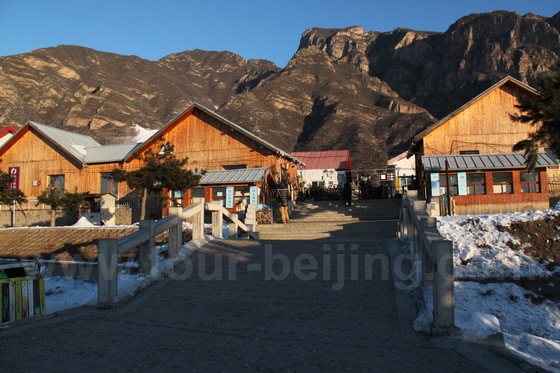 The two wooden houses used as Information Center and Ticket Offices