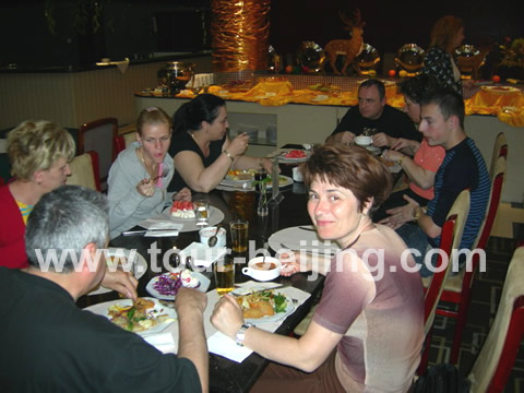 People were enjoying their buffet lunch