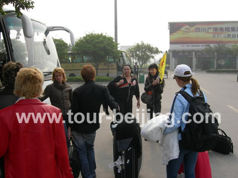 Lily with the small yellow flag - our tour guide in Chengdu met us at the Chengdu Suangliu Interntional Airport. She is helpful and speaks good English.