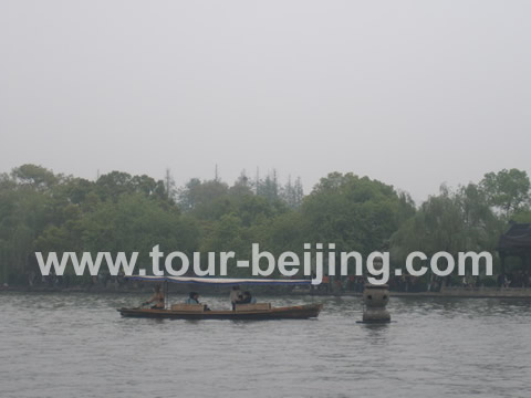 three pools mirroring the moon west lake - the name of the largest of the of three islands in the West Lake