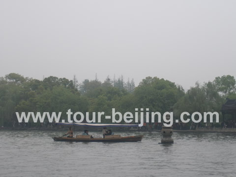 three pools mirroring  the moon west lake - the name of the largest of the of three islands in the West Lake