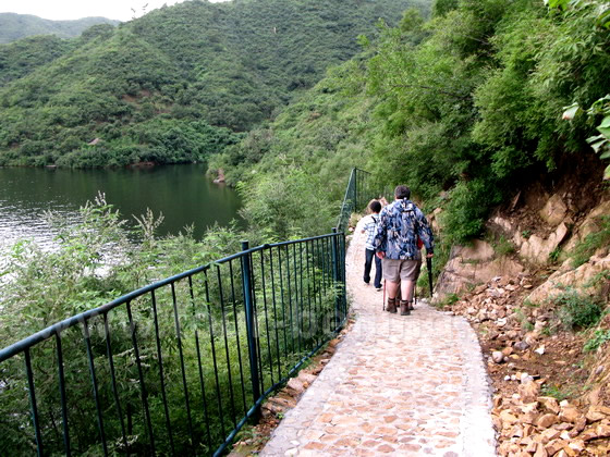 Walking on the trail along the reservoir